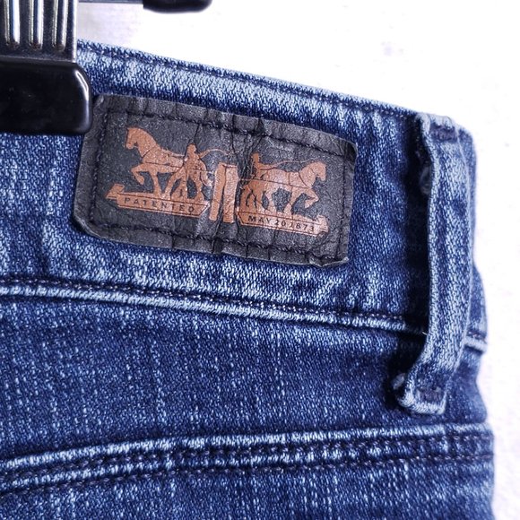 Levi's Women's 16M (33x29) Mid Rise Skinny Jeans, Medium Wash Blue Stretch Denim - Picture 7 of 9